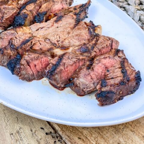 Sliced marinated ribeye steak.